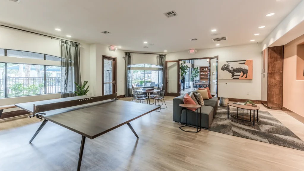 Club room with ping pong table and lounge seating