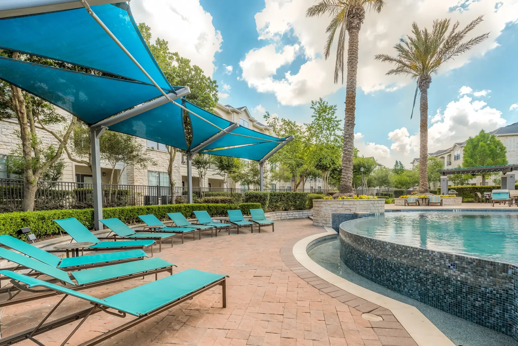 Pool with covered deck seating